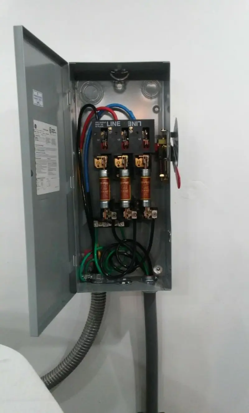 Three-phase disconnect switch installed for Smoke Detector Installation in Harlem