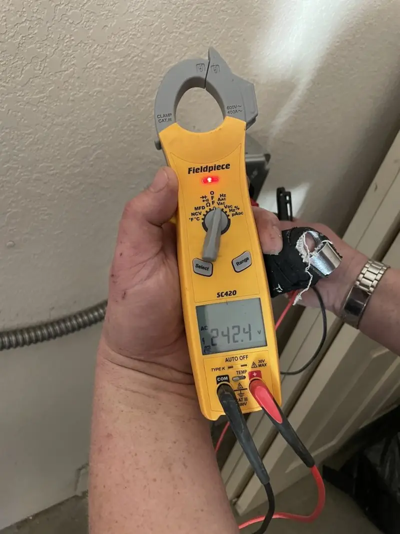 Voltage testing with clamp meter during Generator Installation in Harlem